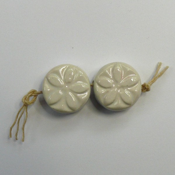 Pair of handmade ceramic button beads in white