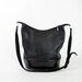 Brighton bucket bag / black leather slouchy sling bag