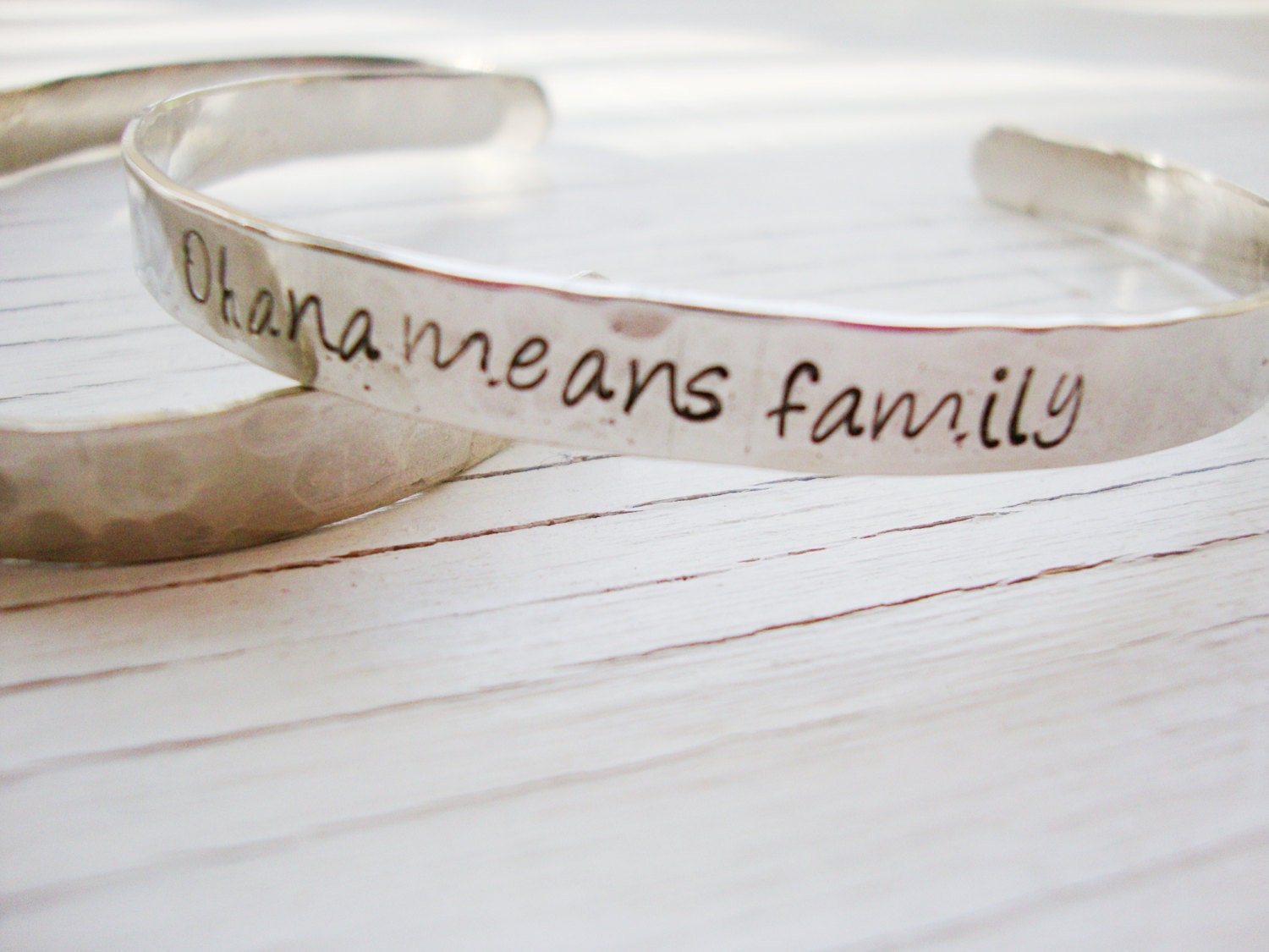 Ohana means family hand stamped inside and out silver bracelet