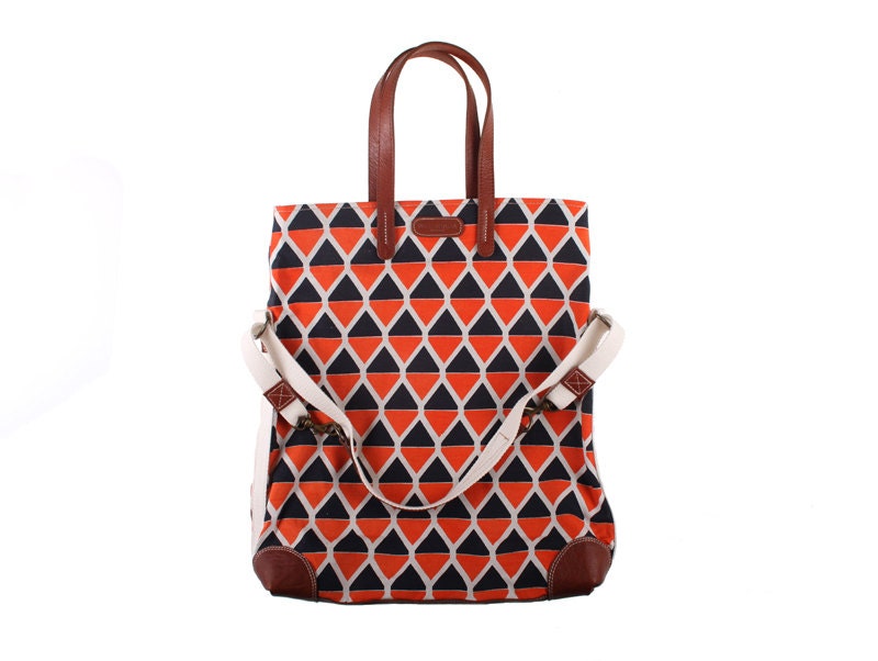 Workhorse bag in dark navy and coral 'owl' print fabric with leather handles and base