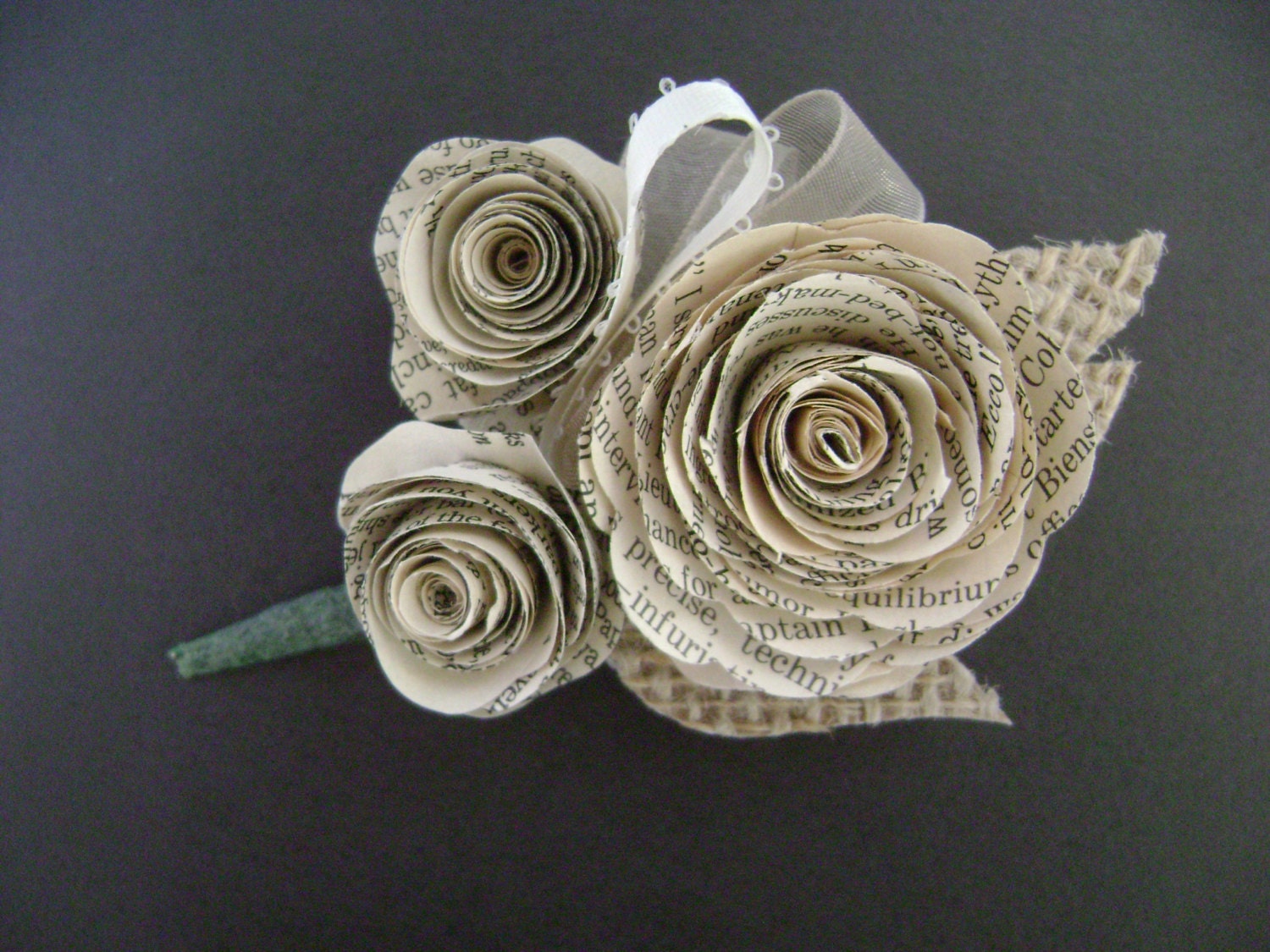 vintage book page spiral rose wedding corsage or boutonniere with burlap leaves for lapel or wrist