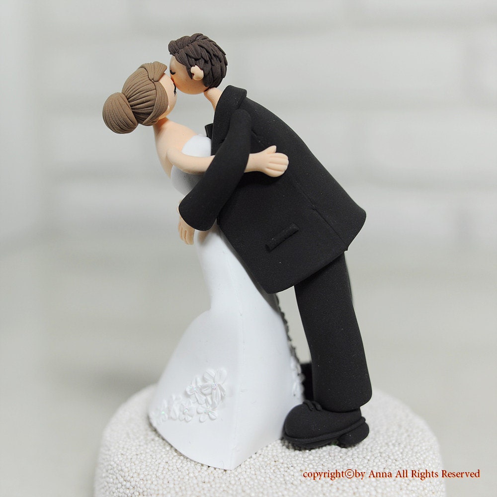 Romantic kissing couple custom wedding cake topper