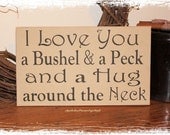 I Love You a Bushel and a Peck and a Hug Around the Neck Wood Sign
