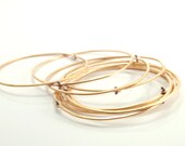 Handmade jewelry. Brass and sterling silver 925 bangles. Modern bracelets.