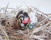 Poppies. Quail egg. Easter egg.Pysanka.