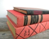 vintage book collection. faded red and black. classic literature. browning. douglas.