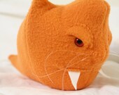 slithering demon kitty monster in orange fleece