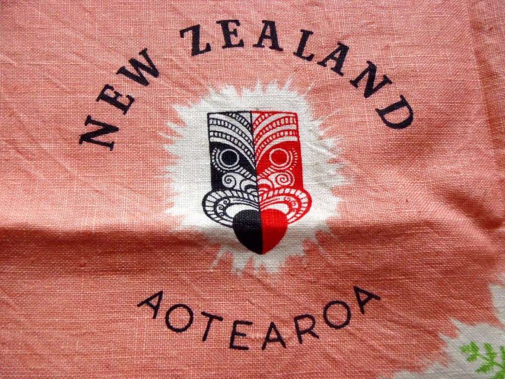 Vintage Pure Irish Linen Tea Towel New Zealand Maori Aotearoa Kiwi Fern Map Mileages Bright Colors on Pink - Black and Red on White Border