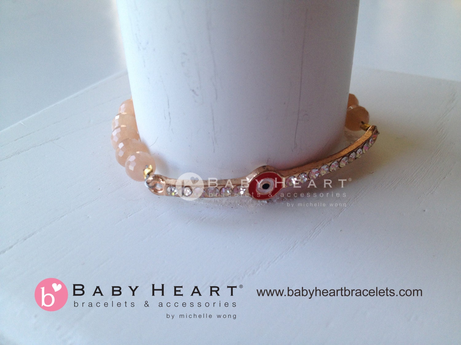 EVIL EYE BRACELET on rose gold bar with pink moonstone