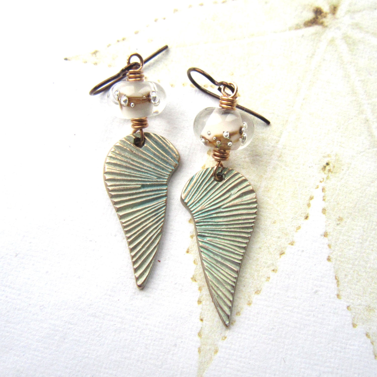 Angels wing earrings, Bronze charm earrings lampwork earrings, pale blue earings