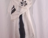 Silk scarf, painted in black and white with floral patterns.