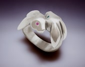 bunny love ring, sterling with blue and pink sapphire eyes