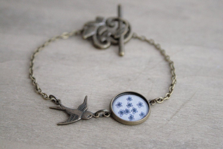 Tiny Blue Flowers Bracelet - Antique Brass Bronze - Bird Connector - 1 Medium Epoxy Glass Cabochons - Tiny Blue Purple Flowers