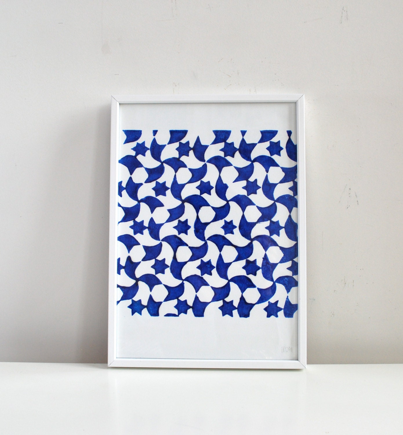 Blue pattern relief print, Islamic stars and swirls in ultramarine blue and white