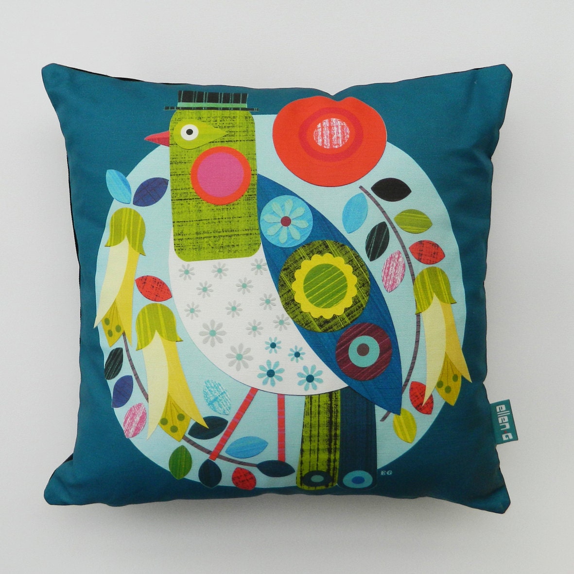 Ellen Giggenbach flowers and bird on blue and green, pillow