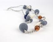 Blue & White Felt Bead Necklace With Amber Acrylic Beads