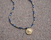 Gold-plated brass & lapis necklace with Lotus symbol pendant