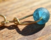 Blue crackly glass pendant, recycled African glass bead on gold chain