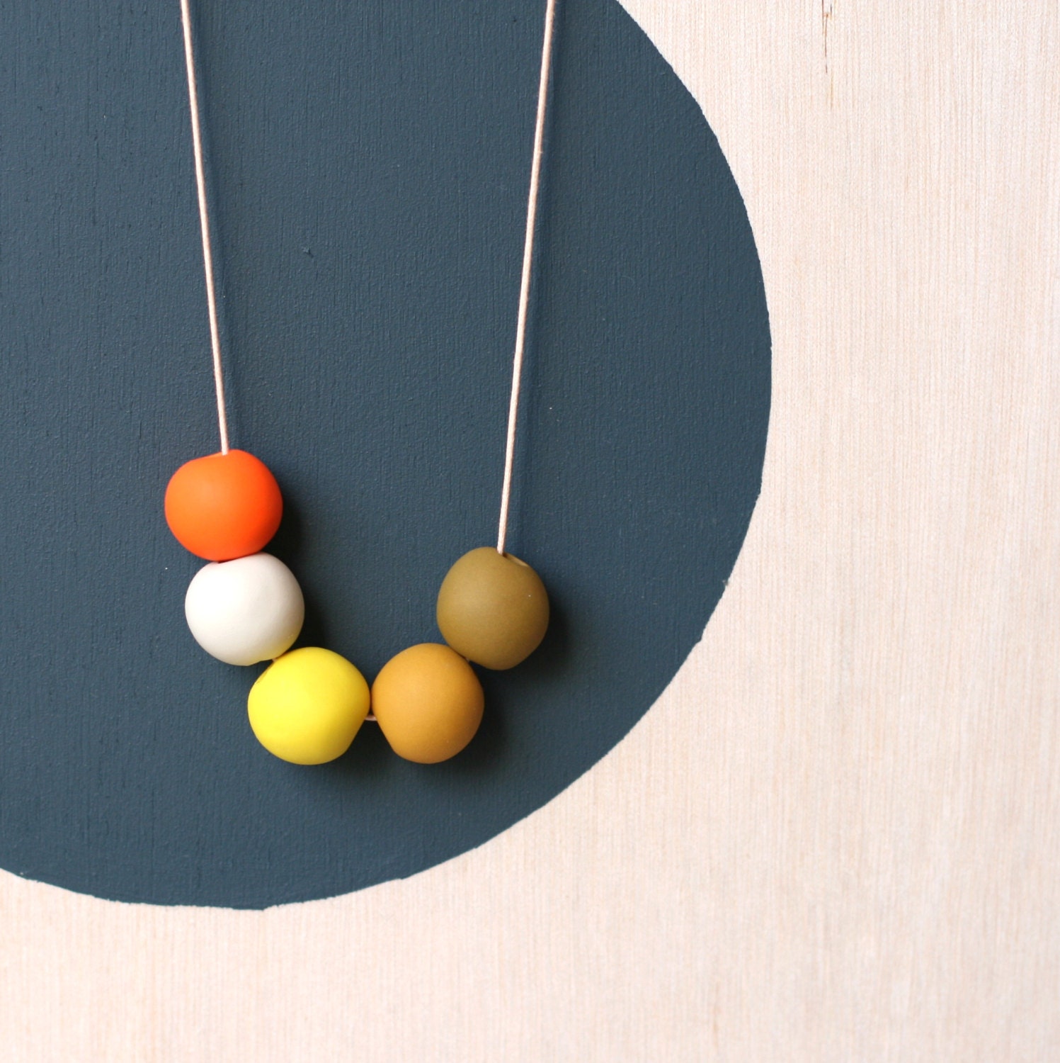 not quite round handmade beads make a necklace