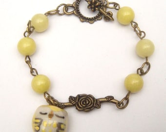 Antiqued Brass Branch Porcelain Owl Jade Bracelet