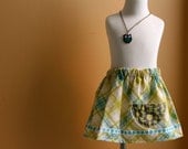 Little Girls Skirt   green/turquoise plaid print with corn field pocket  and turquoise flower ribbon trim   6-12 mo,12-18 mo,2T,3T,4T,5T