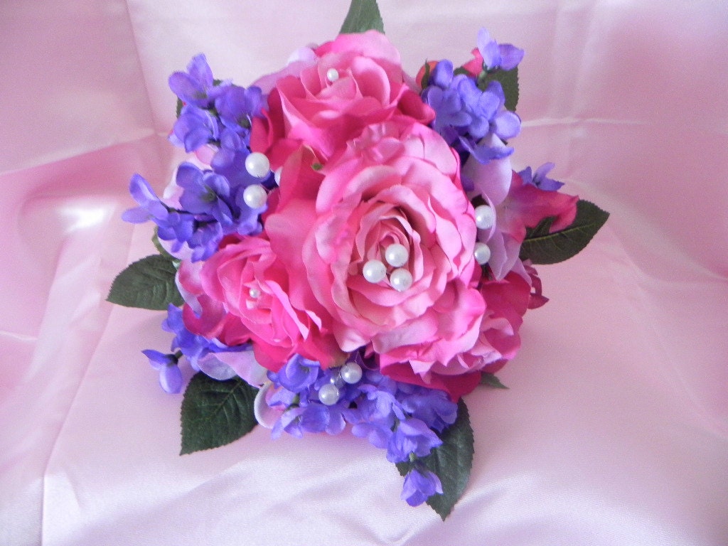 bridal bouquet of roses, lilacs and orchids