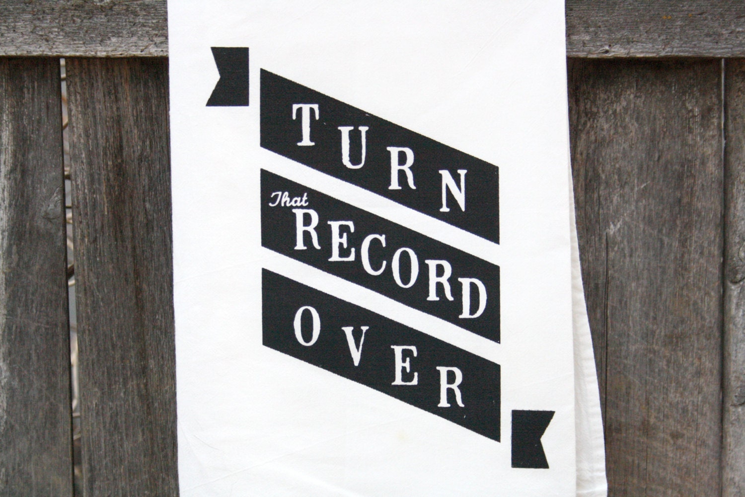 Tea Towel "Turn That Record Over" banner print in black ink on white towel