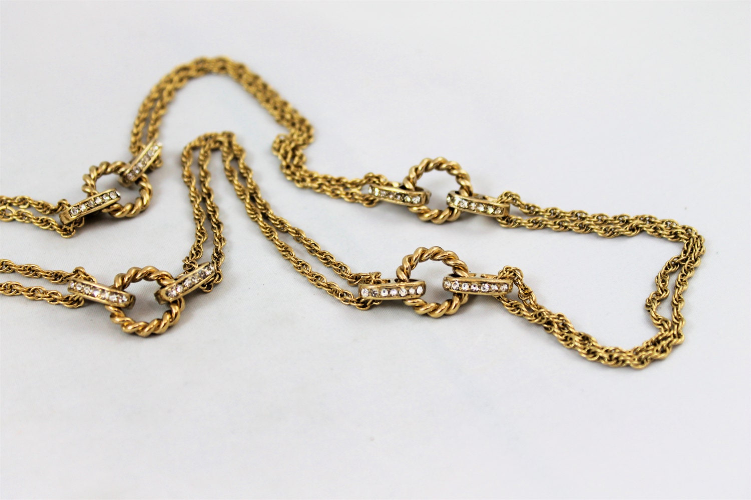 Monet long gold necklace double rope chain rhinestone oval links twisted circles excellent signed vintage high fashion modern 40"