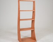 Bookcase Flowing Shape 5 Feet Tall 4 shelf Wood Custom - The Flame - a MapleBear design