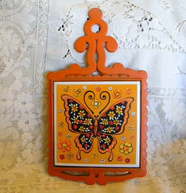 Butterfly metal trivet mid century orange country design