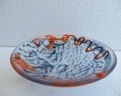 bowls of glass with brain structures and hieroglyphics