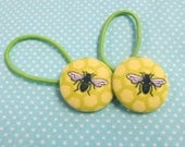 button hair elastics set of 2 bee designs on lime honey comb fabric