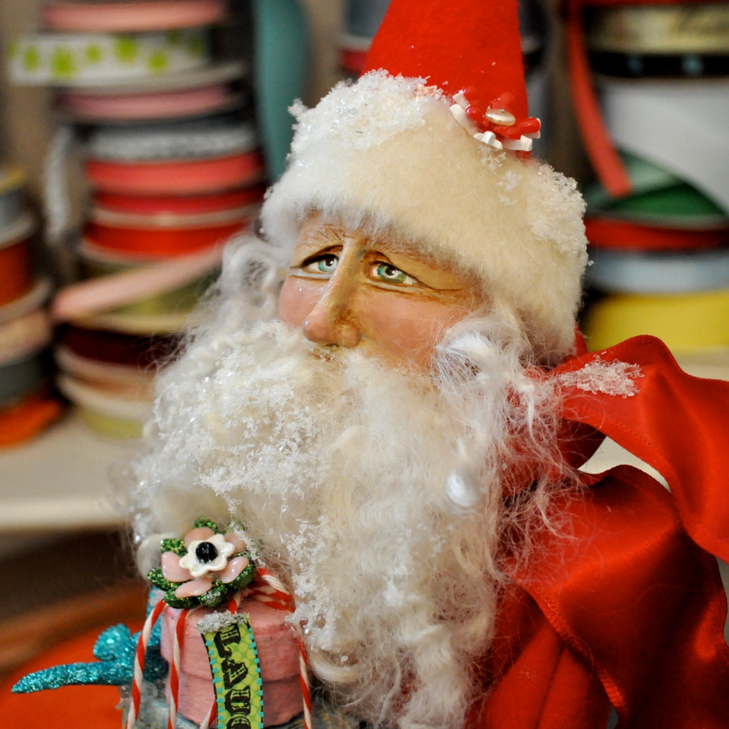 Santa art doll holding a stack of gifts - one of a kind clay and cloth figure