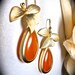 Gold filled Earrings with ORANGE dyed Jade stone and a gold wild orchid flower- Beautiful Jewelry -