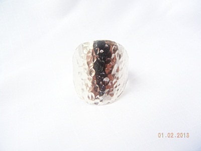 Beautiful hammered silver ring. Face of Ring is a Large Round to Reveal the Quality of the Silver. Shine.