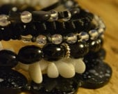 Black and white monochrome stacking bracelets - Cancer Charity