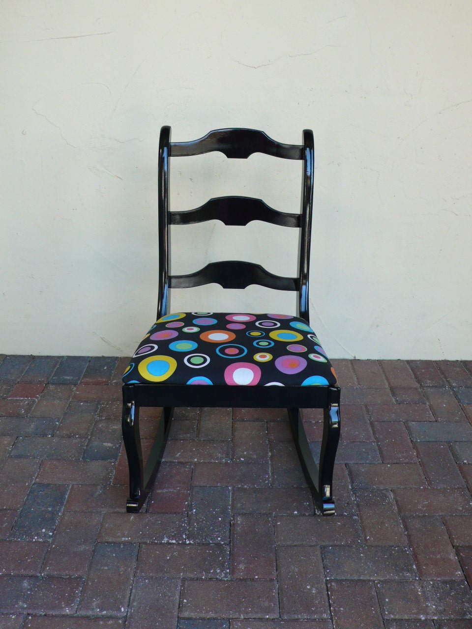 Unusual mid century modern mcm rocking chair with black colorful circle fabric