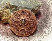 Bronze Protection Eye Star Pendant with a Rose cut Sapphire