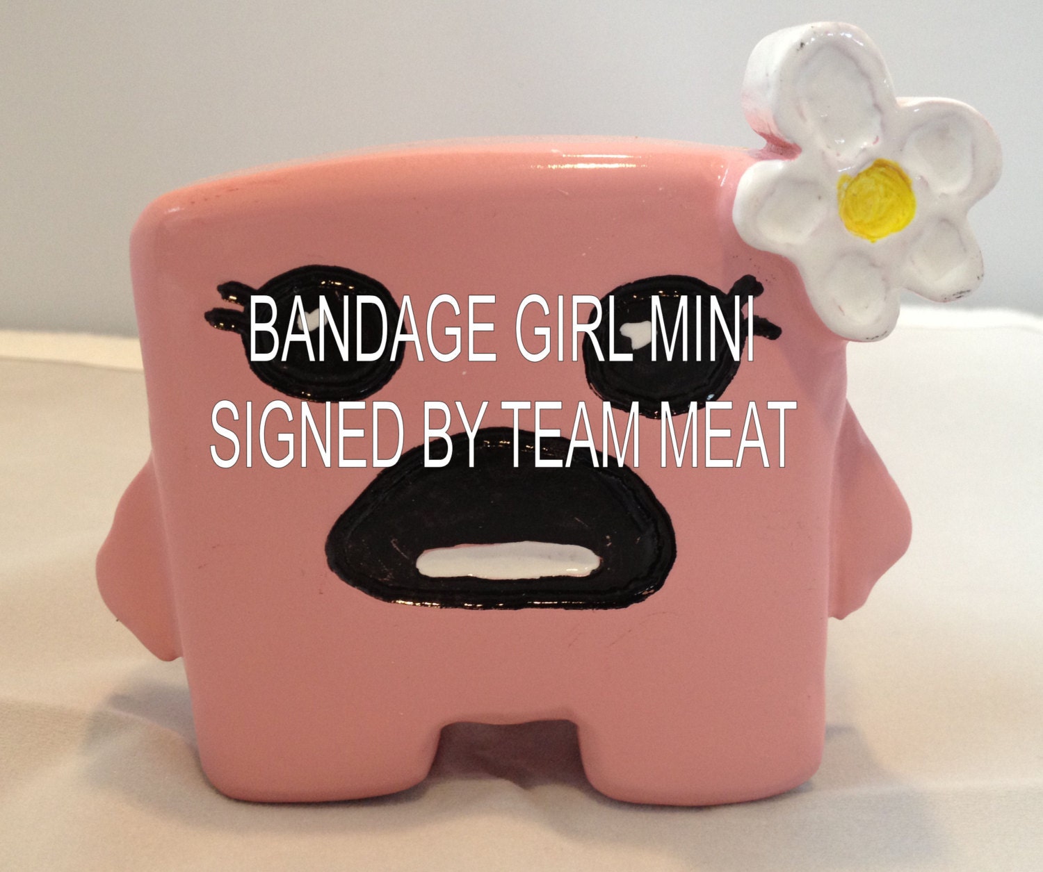 Hand crafted BANDAGE GIRL MINI signed by Team Meat
