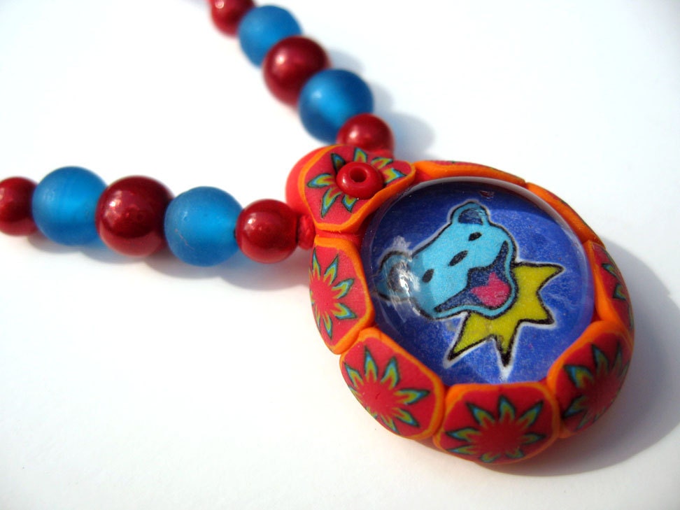 Grateful Dead teardrop pendant, dancing bear millefiori patterns, made from polymer clay and glass, on cord with mixed beads