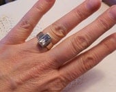 Vintage clear quartz stone sterling silver ring.  Signature. Looks like diamond. Chunky.