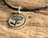 Chrysanthemum flower in Fine Silver on Leather
