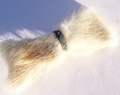 Fur bow tie brooch. Vintage fashion. Trending style. British