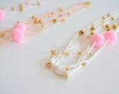 Star and pompom necklace in white