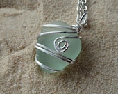 Wire wrapped seafoam green sea glass necklace with two kinds of wire