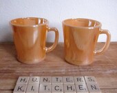 Set of 2 vintage peach lustre mugs, American 1950s Fire King
