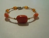 Orange gold and pearly white dainty bracelet