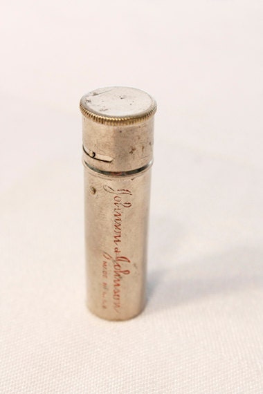 Vintage Johnson & Johnson Silver Travel Powder Tube
