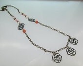 Antique Bronze Necklace with Rose charms and White Magnesite and Red Bamboo Coral