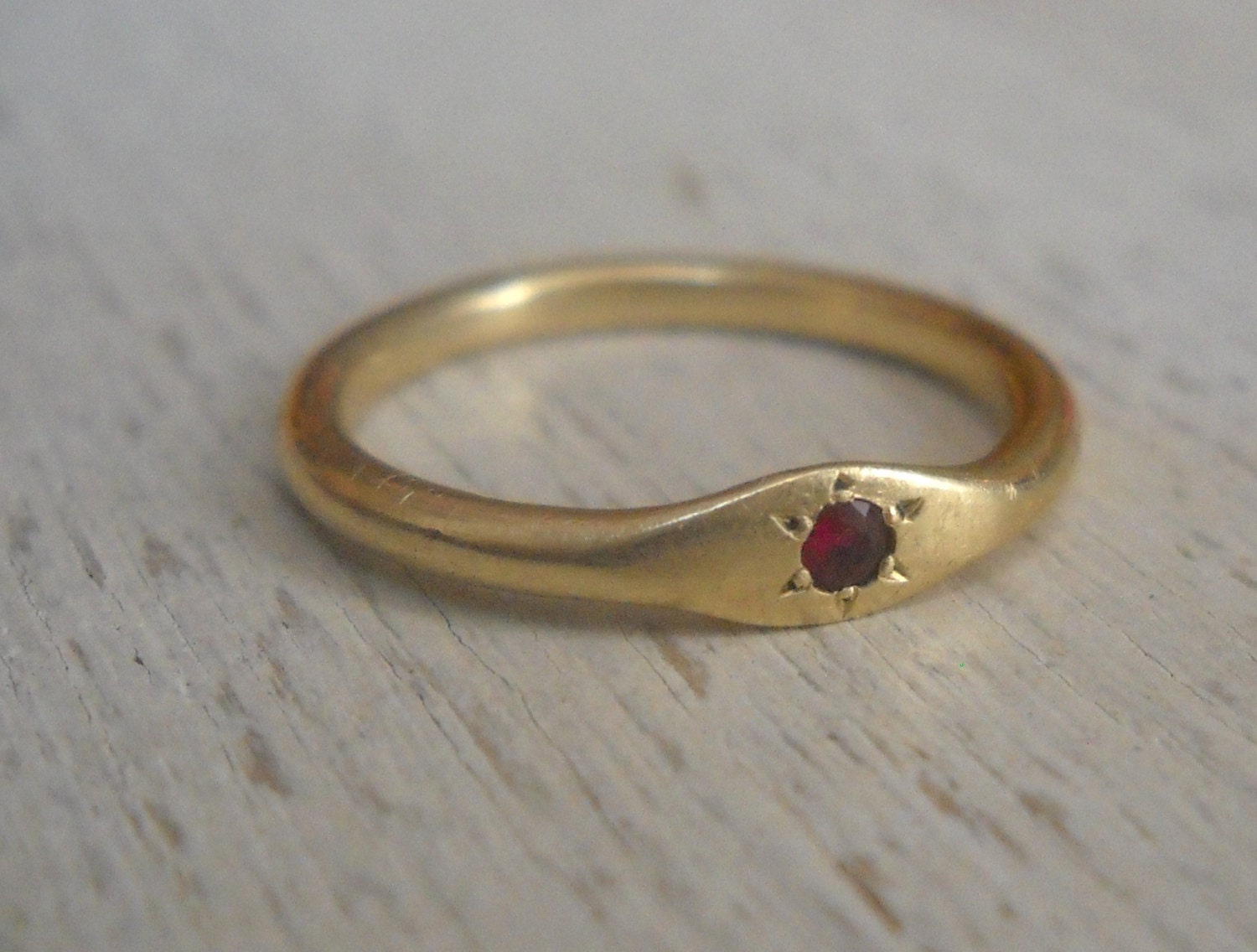 14k Gold and ruby ring. 14k solid gold ring set with a 2mm ruby stone. Star shape. Engagement ring. Handmade.